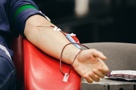 The donor blood donates blood in the clinic featuring blood, donor, and