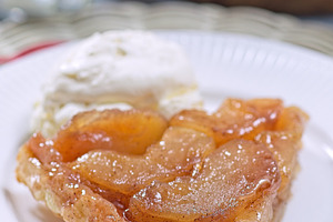 Apple tarte tatin with scoop of whipped cream, french upside down cake, vertica, a Food & Drink Photo by iuliia_n