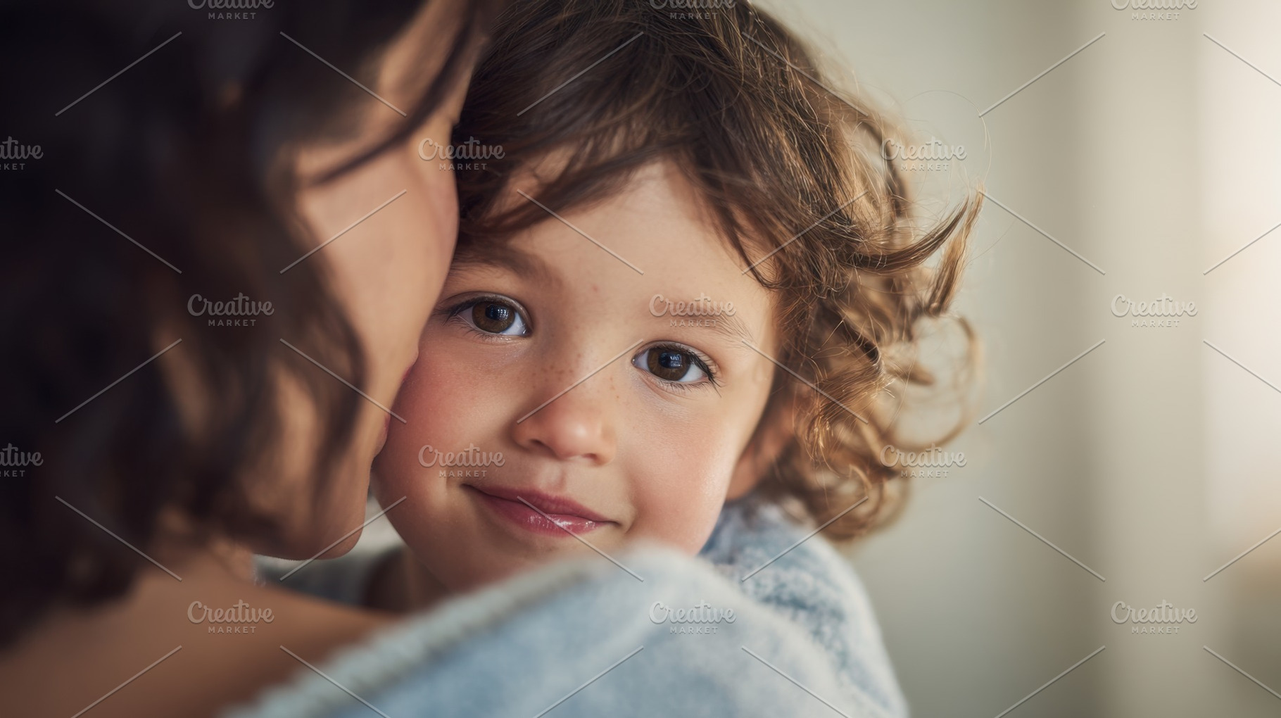 Mother hugs child in warm embrace, a Photo by Beautiful things