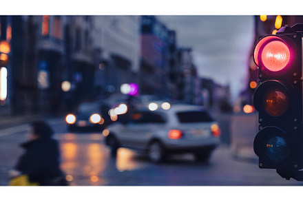 Traffic light on the evening city, a Transportation Photo by VictorGrow