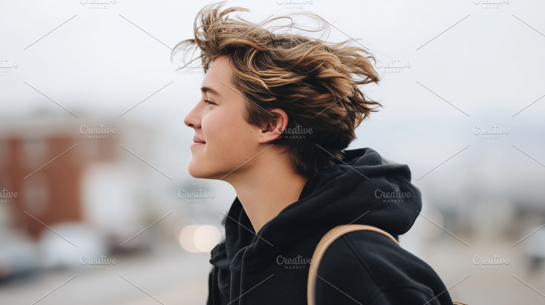 Smiling young person with windswept, a Person Photo by MistyDay