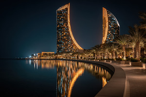 Night view of illuminated twin tower, a Photo by Pixeness Studio
