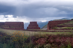 Ancient Inca Ruins of Rumicolca Under a Cloudy Sky in Peru, an Architecture Photo by GoodGoods