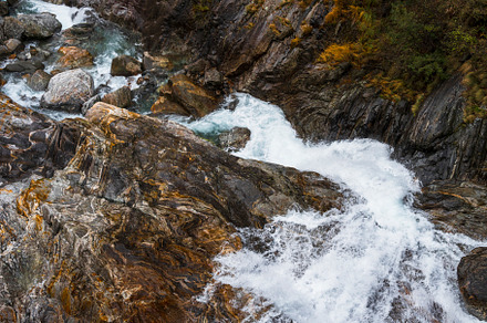 Waterfall on rock mountain, a Background Photo by Simmi Simons