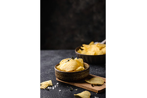 Crispy salty homemade potato chips, a Food & Drink Photo by Yulia Furman