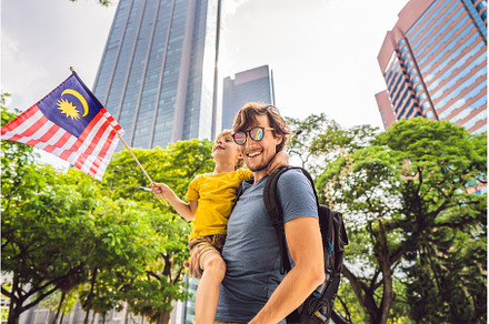 Dad and son tourists in Malaysia, a Person Photo by Elizaveta Galitskaya