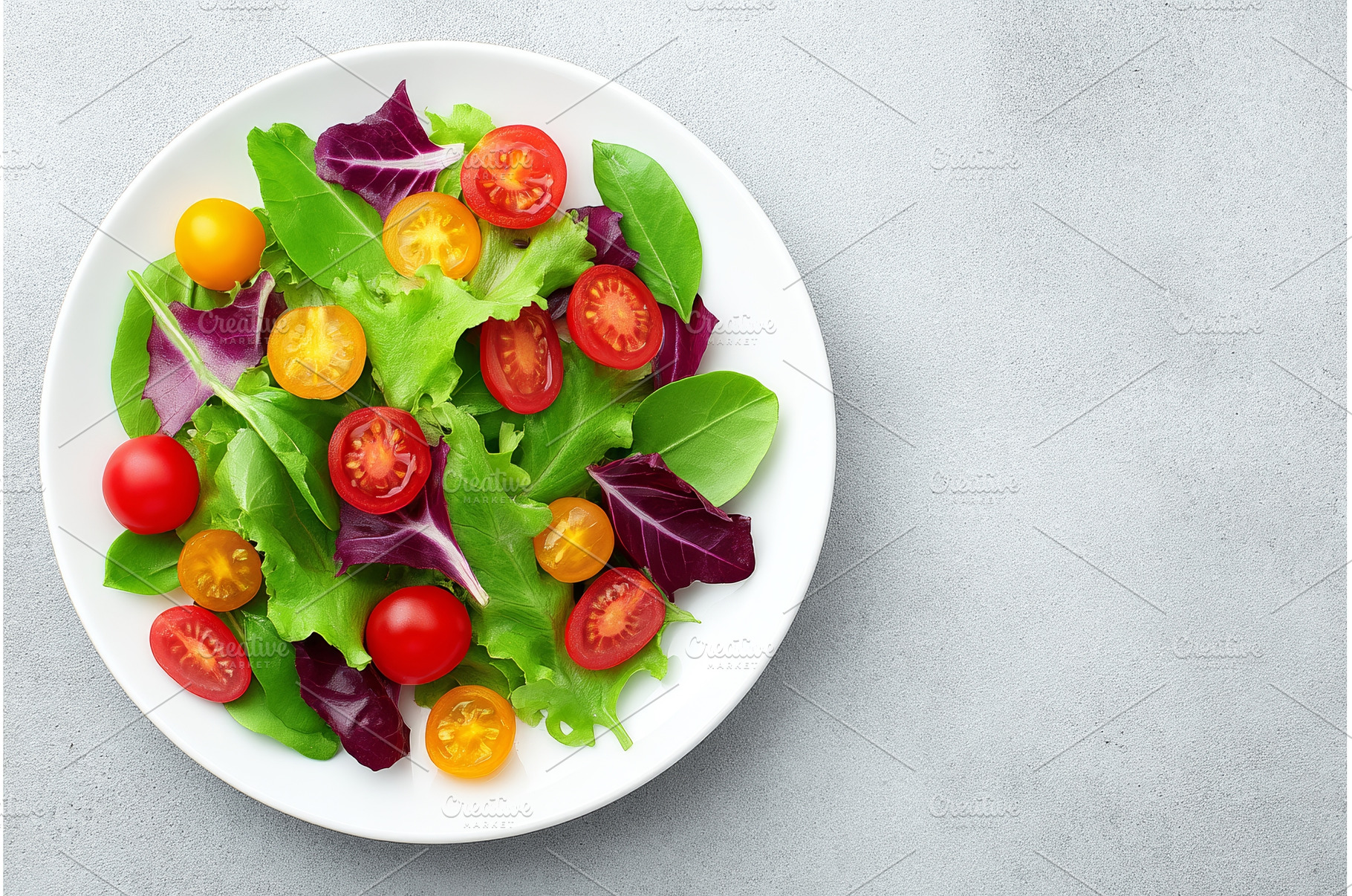 A bowl of mixed greens, tomatoes, a Food & Drink Photo by ZinetroN