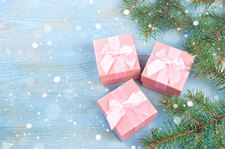 Christmas gifts with pink ribbon containing advent, background, and birthday, a Holiday Photo by Alim Yakubov