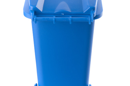 Plastic blue trash can isolated on white background