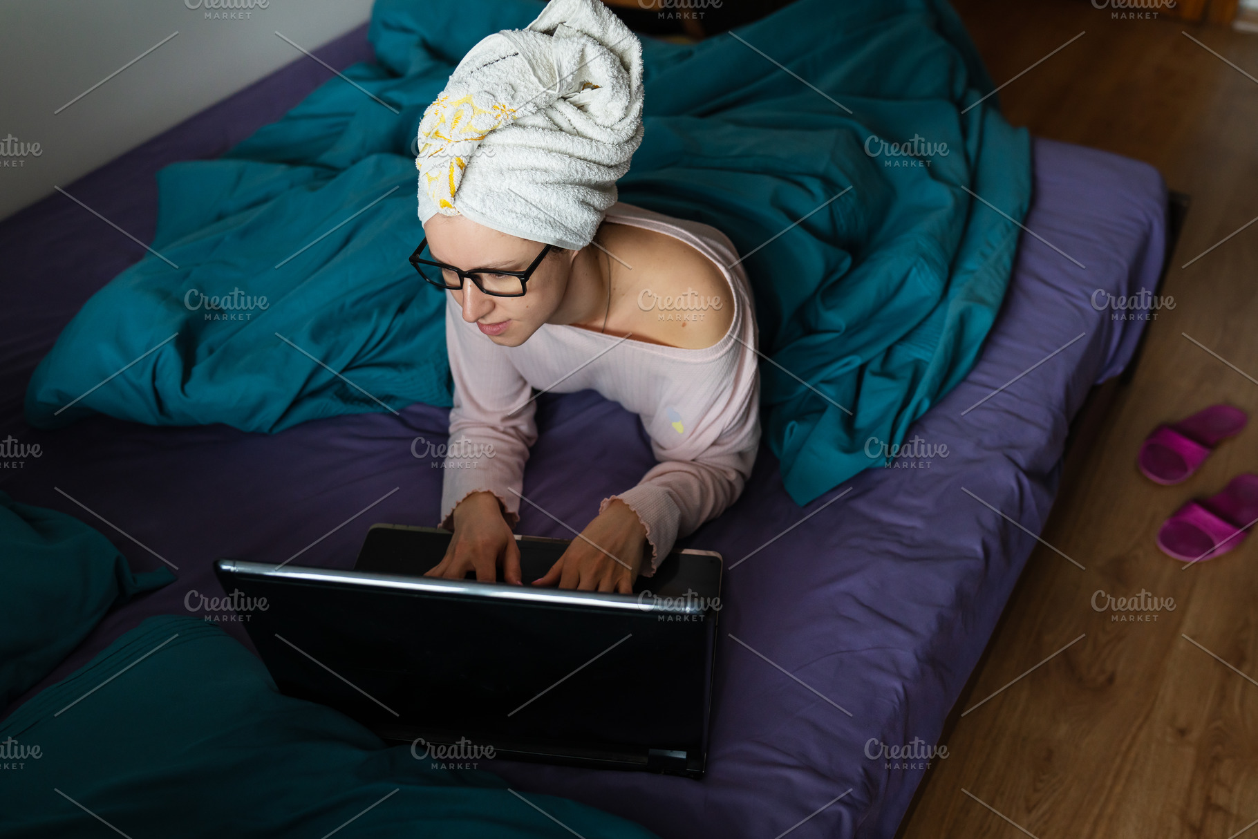 Home office, telecommuting, isolation, quarantine. A young girl working on a la, a Person Photo by Artsaba Family