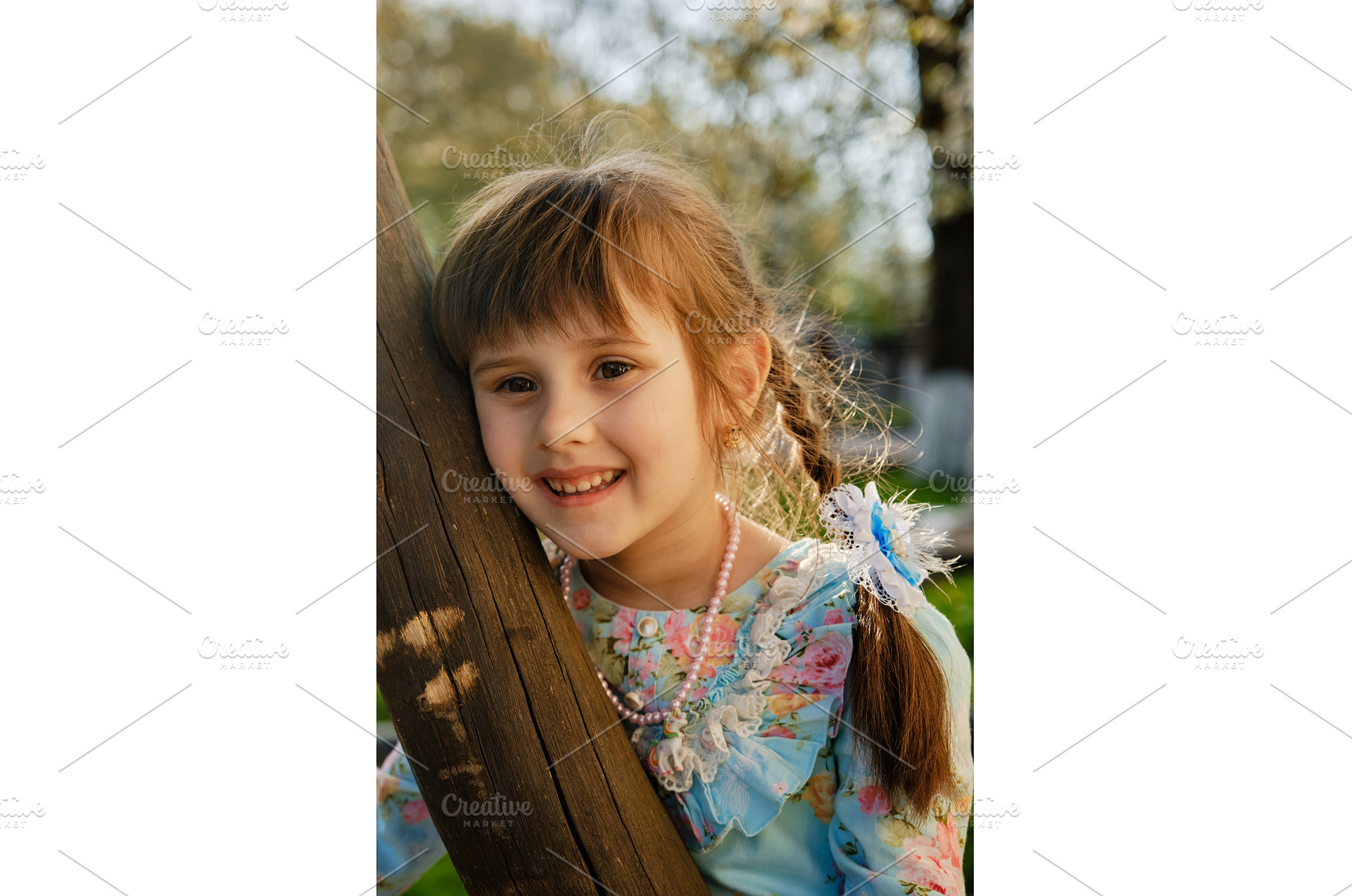 A charming child girl smiles while, a Person Photo by Rohan Photography