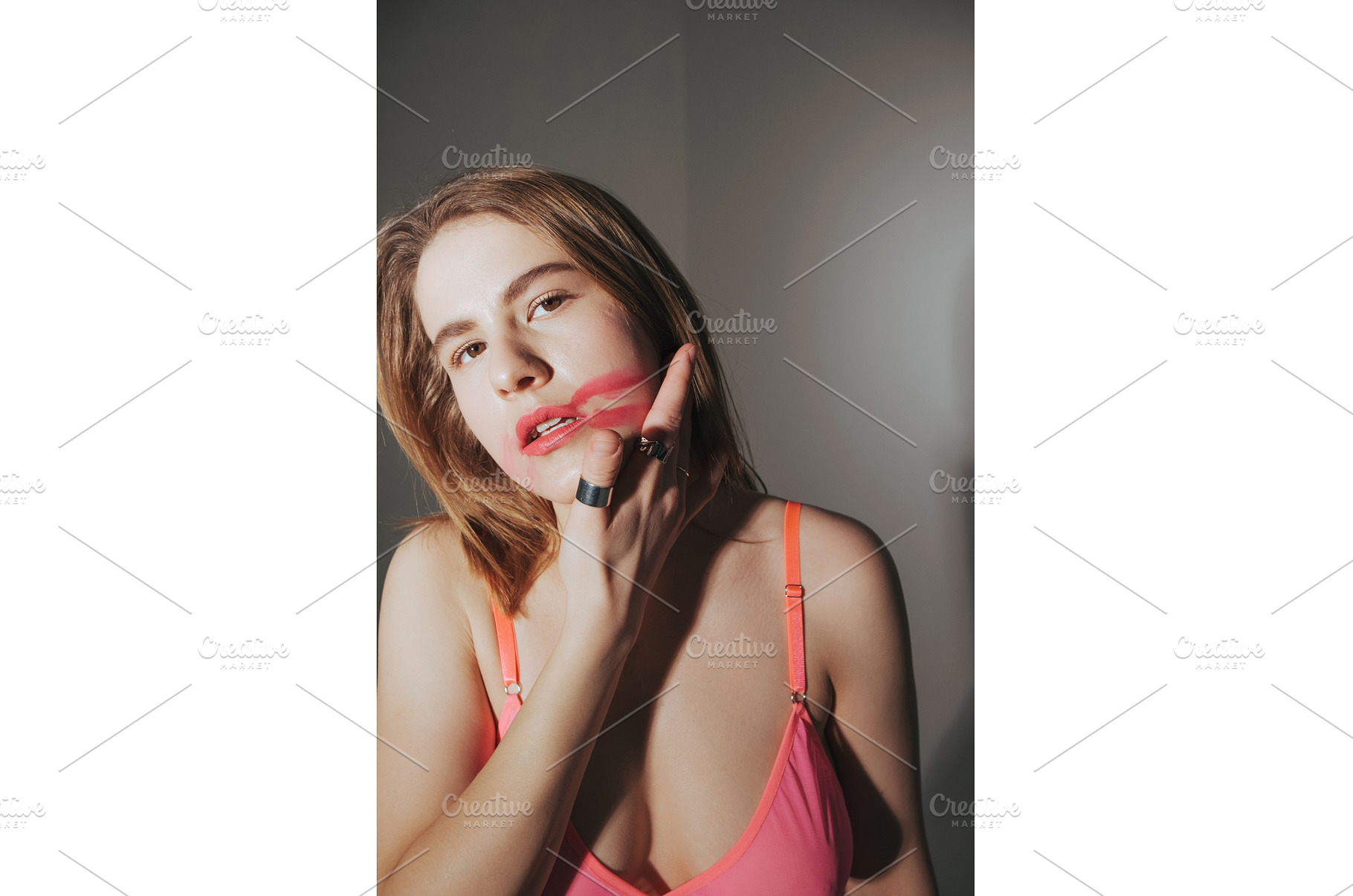 Fashion model in pink suit smears, a Beauty & Fashion Photo by zheckasmk