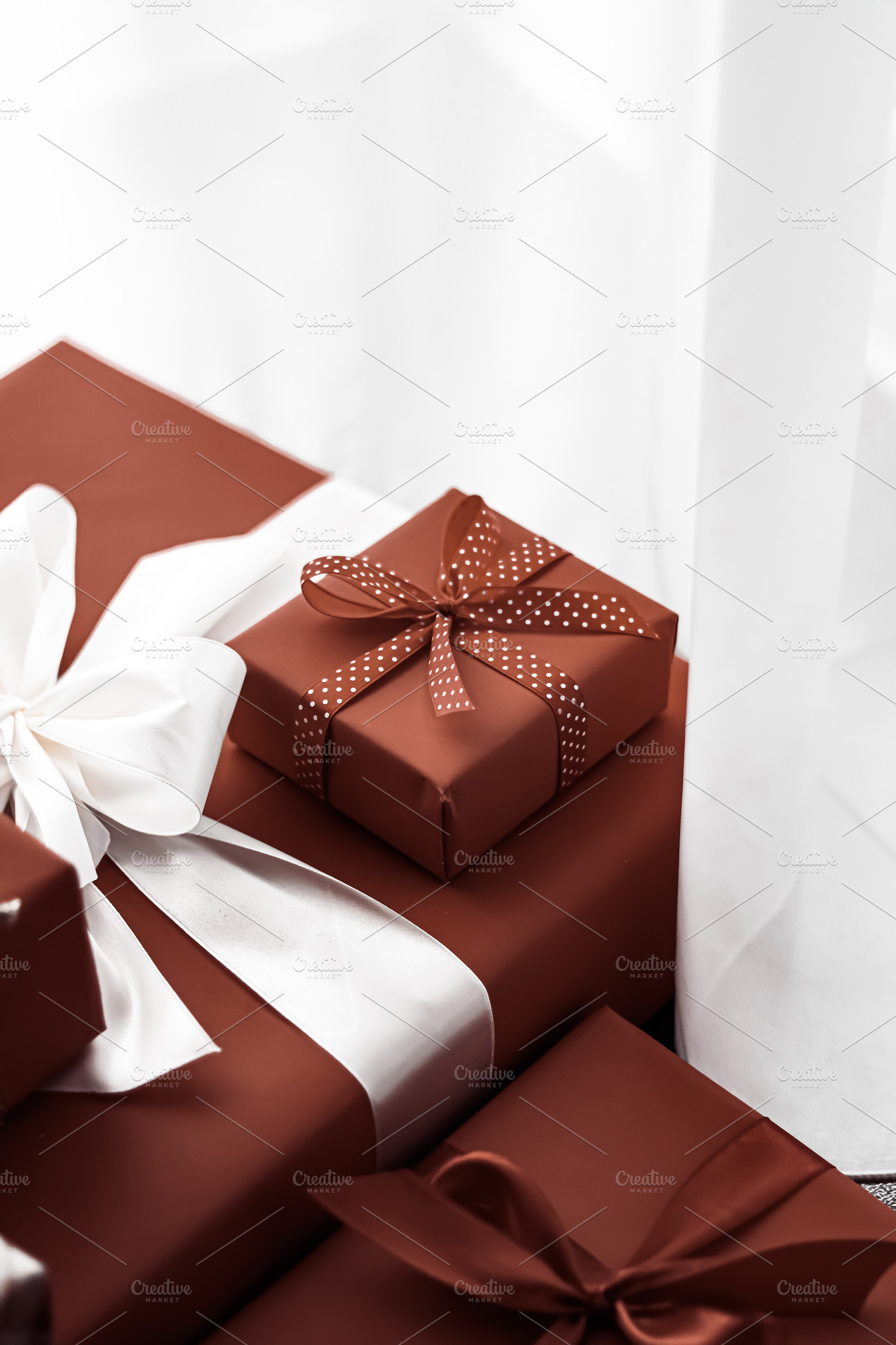 Holiday gifts and wrapped luxury presents, chocolate gift boxes, a Holiday Photo by Studio ANNA