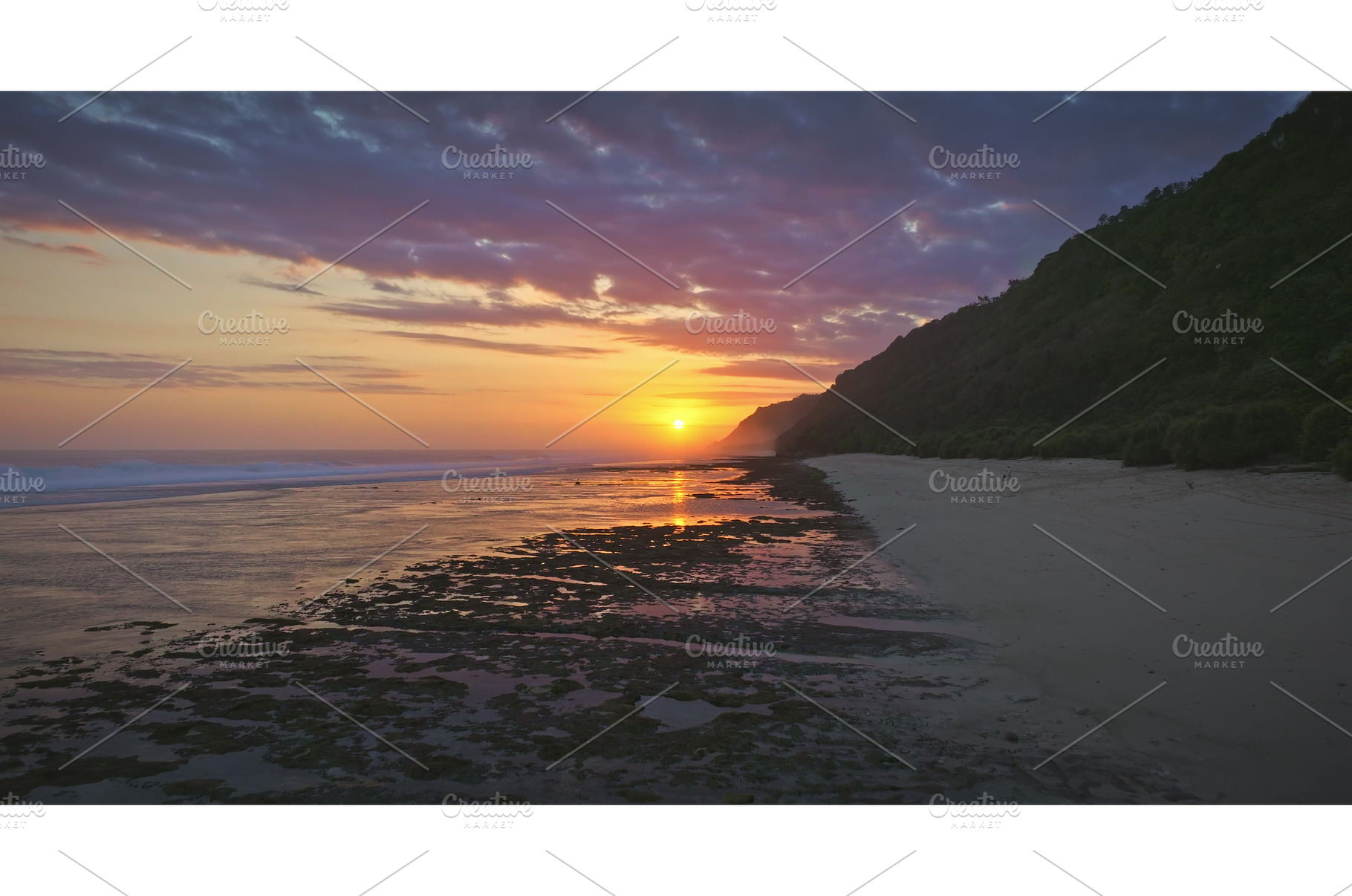 Bali sunset illuminating a beach, a Nature Photo by Goinyk