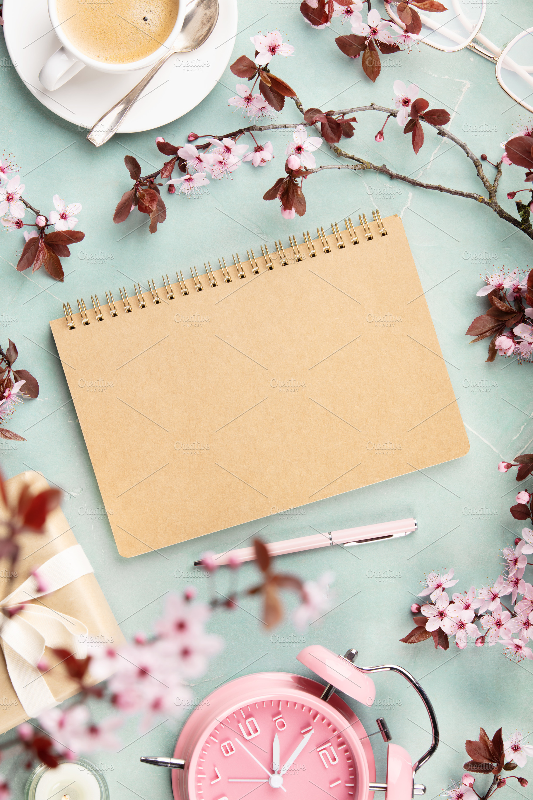 Spring Workspace Flat Lay with Notebook, Coffee and Pink Alarm C, a Holiday Photo by Natalia Klenova's Shop