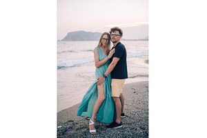 Happy Couple Embracing on a Sandy, a Person Photo by Jan Jack Russo Media