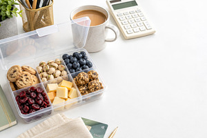 Snackle box with various snacks on w, a Photo by Dvoevnore photos