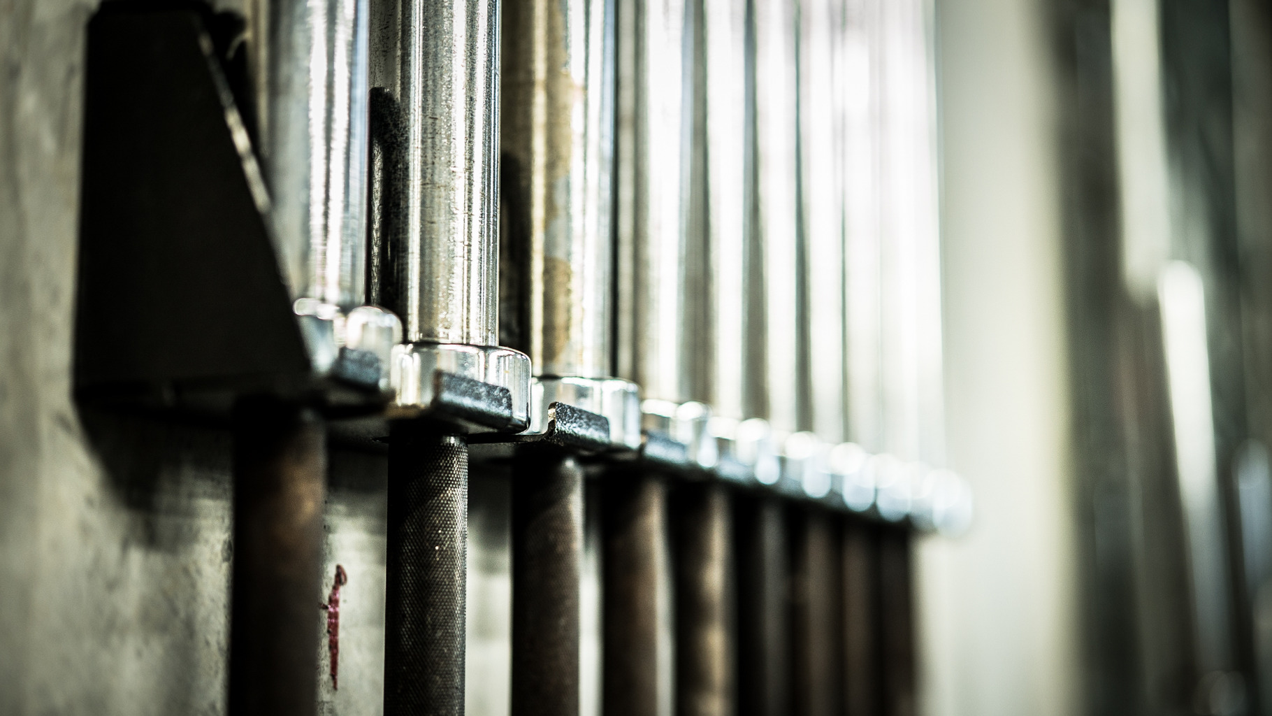 Rack Of Barbells At A Crossfit Gym, a Sports & Recreation Photo by Snake Eye Media