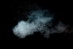 Dust cloud on black background