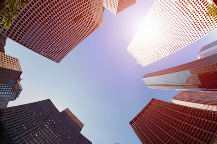 Skyscraper in the financial district stock photo containing sunset and sun, an Architecture Photo by FunkyMedia