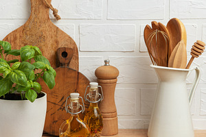 Rustic kitchen decor with herb and utensils, a Food & Drink Photo by Olena Rudo