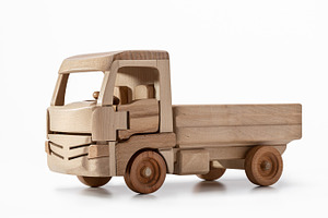 Models of trucks from wood featuring car, wooden car, and toy