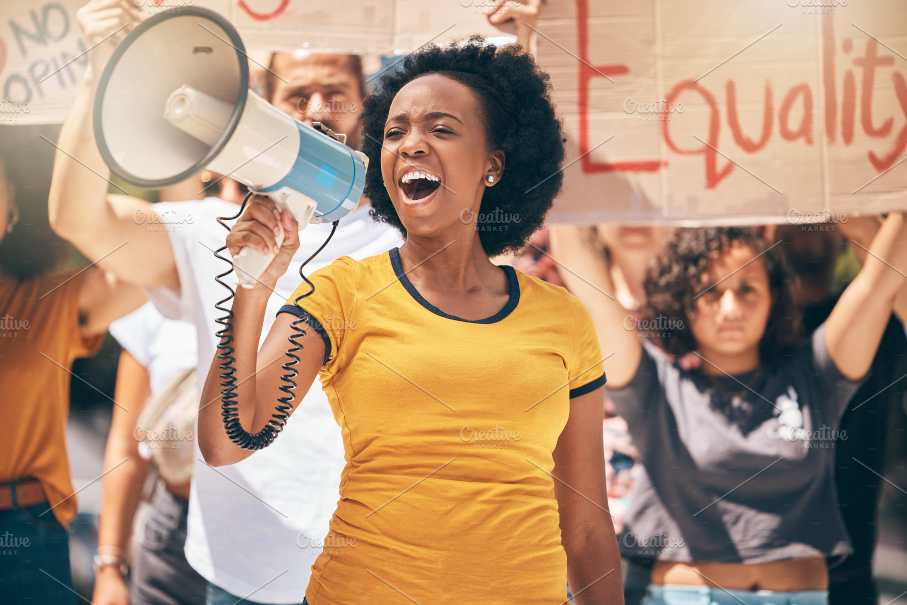 Megaphone, freedom or women equality protest for global change, gender equality or black woman speaker fight for support. Crowd poster banner, city speech or human rights rally by justice warrior, a Photo by Peopleimages.com