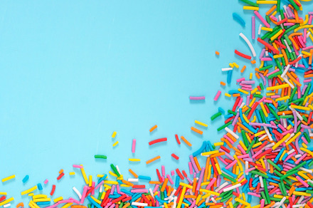 Border frame of colorful sprinkles stock photo containing sweet and confetti, a Holiday Photo by Fascinadora