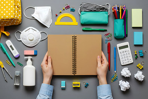 Student Holding Open Notebook Surrou, a Photo by Stock Shape