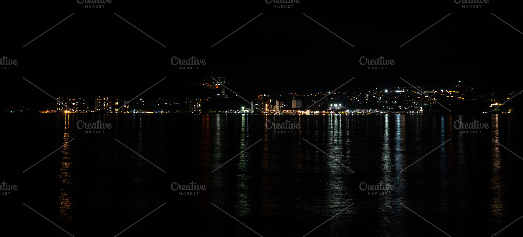 Night view of Hiroshima Bay from Miyajima island in Japan, an Architecture Photo by GoodGoods