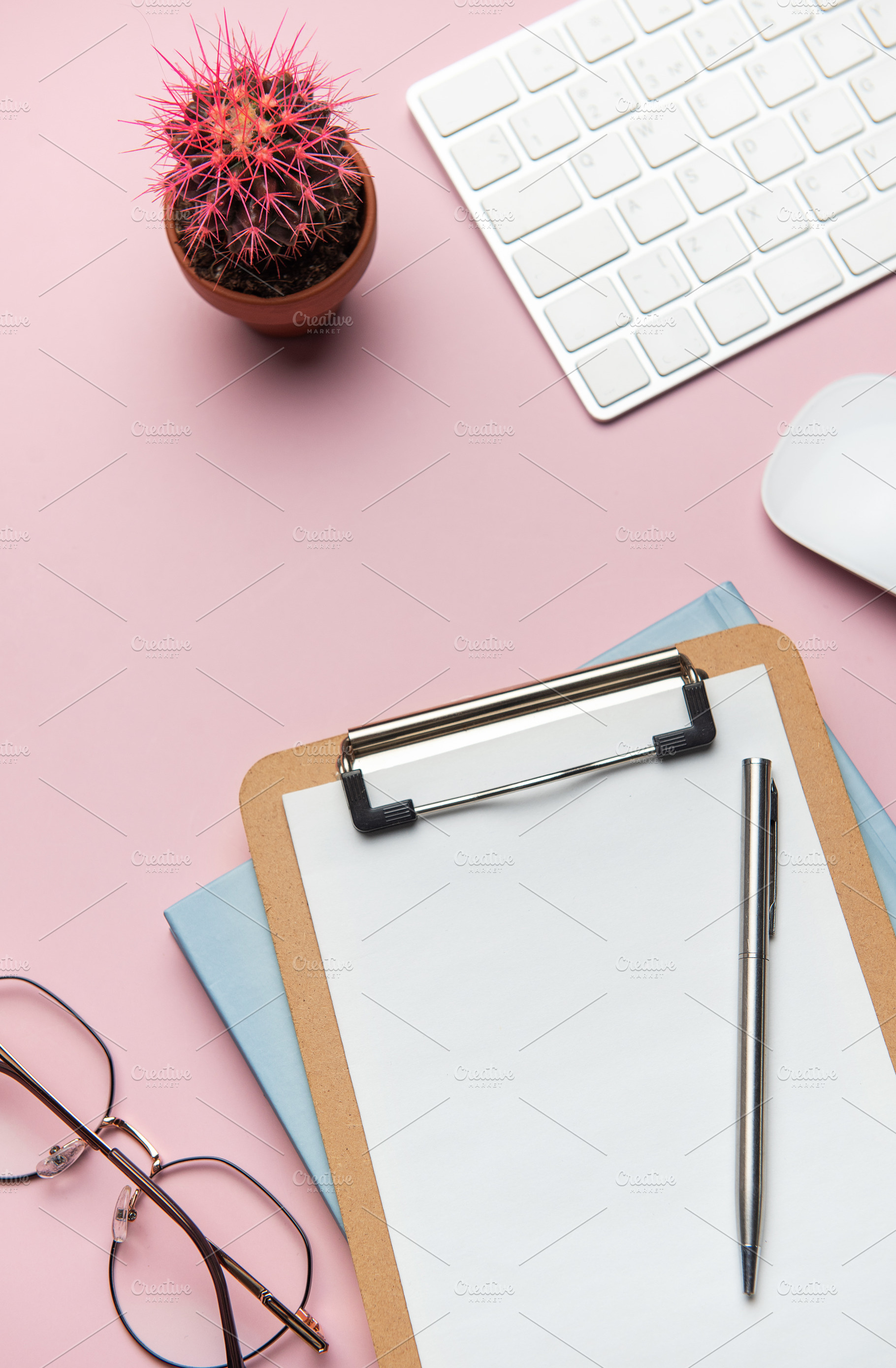 Workspace organizing accessories on pink tabletop for business p, a Business Photo by Olena Rudo