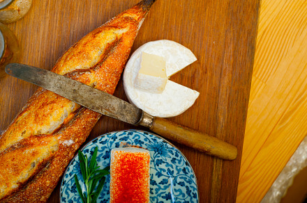 French cheese and fresh  baguette on a wood cutter, a Food & Drink Photo by keko64