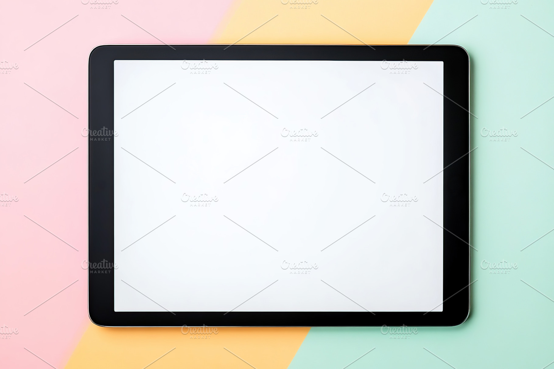 A tablet with a blank white screen is set against a vibrant geometric backdrop, a Technology Photo by AlyaAnd