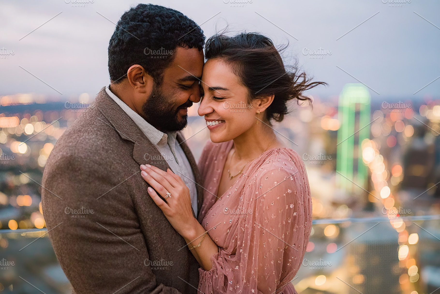 Couple enjoys a romantic moment on a rooftop with city lights in the background, a Photo by AlyaAnd
