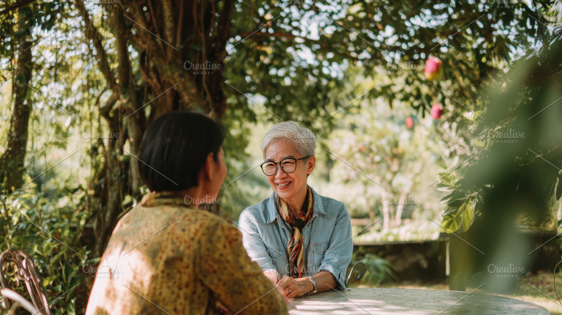 Friends laugh in the garden, a Photo by Beautiful things