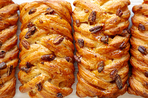 Homemade Maple Pecan Danish Pastry, top view. Flat lay, overhead, a Food & Drink Photo by LiudmylaChuhunova