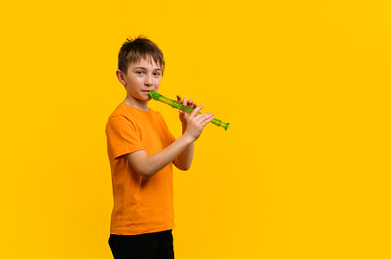 Boy with blockflute in studio, a School & Education Photo by Elena Vagengeim