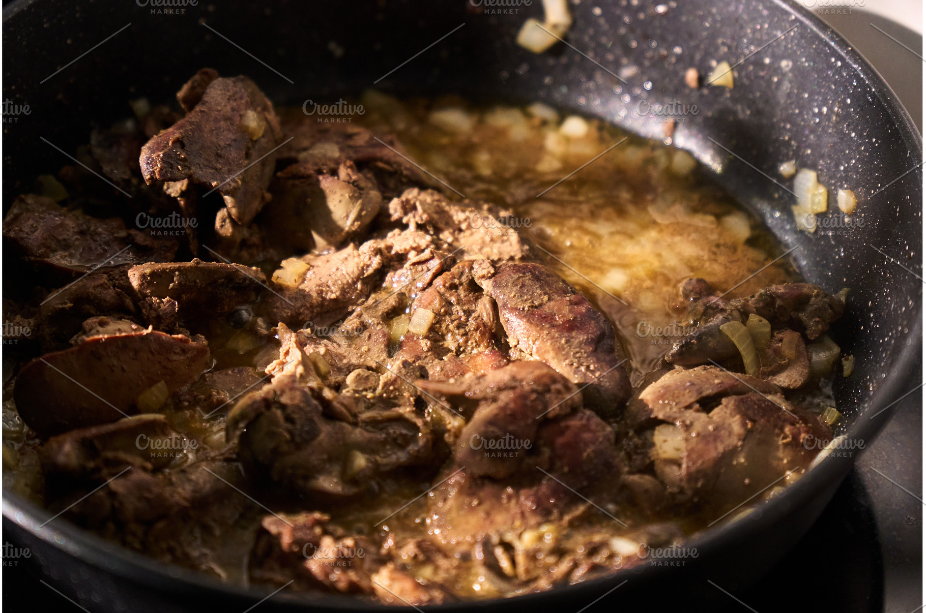 Cooking sliced liver with onions in, a Food & Drink Photo by darksoul72