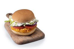 Crispy chicken burger with lettuce,onion,tomato and mayo, a Food & Drink Photo by etorres69