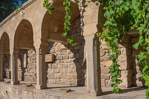 Ancient stone arcade in Icherisheher with green leaves and copy, a Photo by Pictures for you!!!!!!!!!