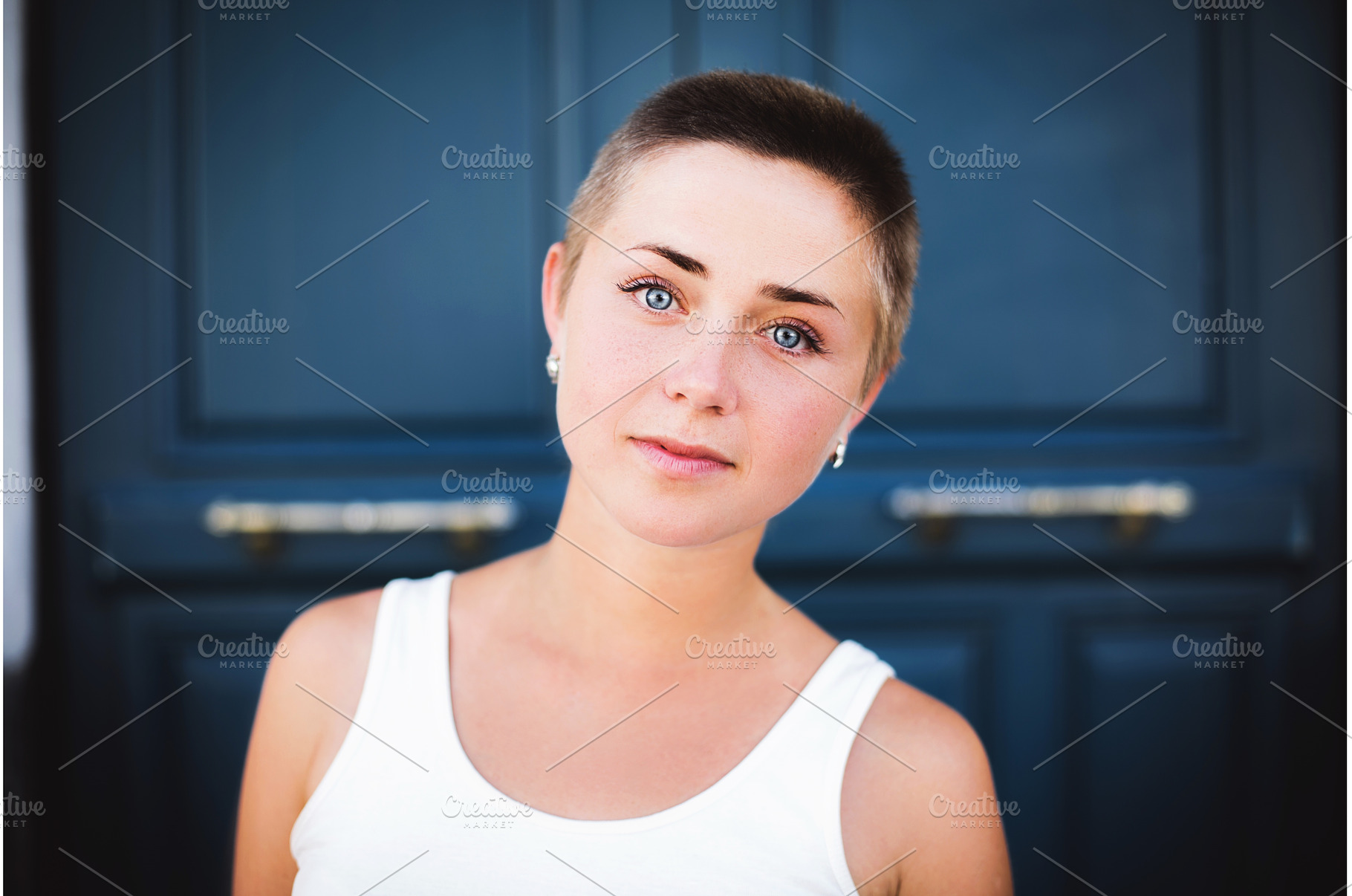 Young woman with buzz cut and blue, a Beauty & Fashion Photo by Anna Efetova