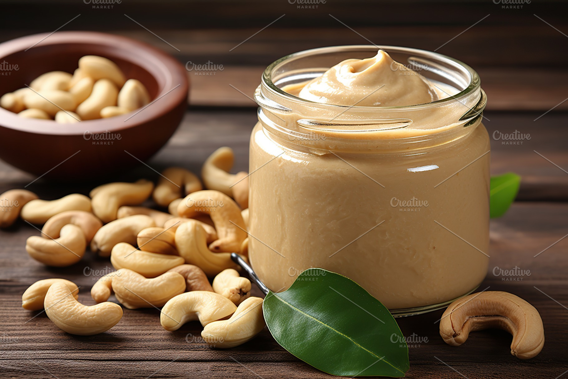 Glass jar with cashew butter on wooden table, a Food & Drink Photo by AlyaAnd