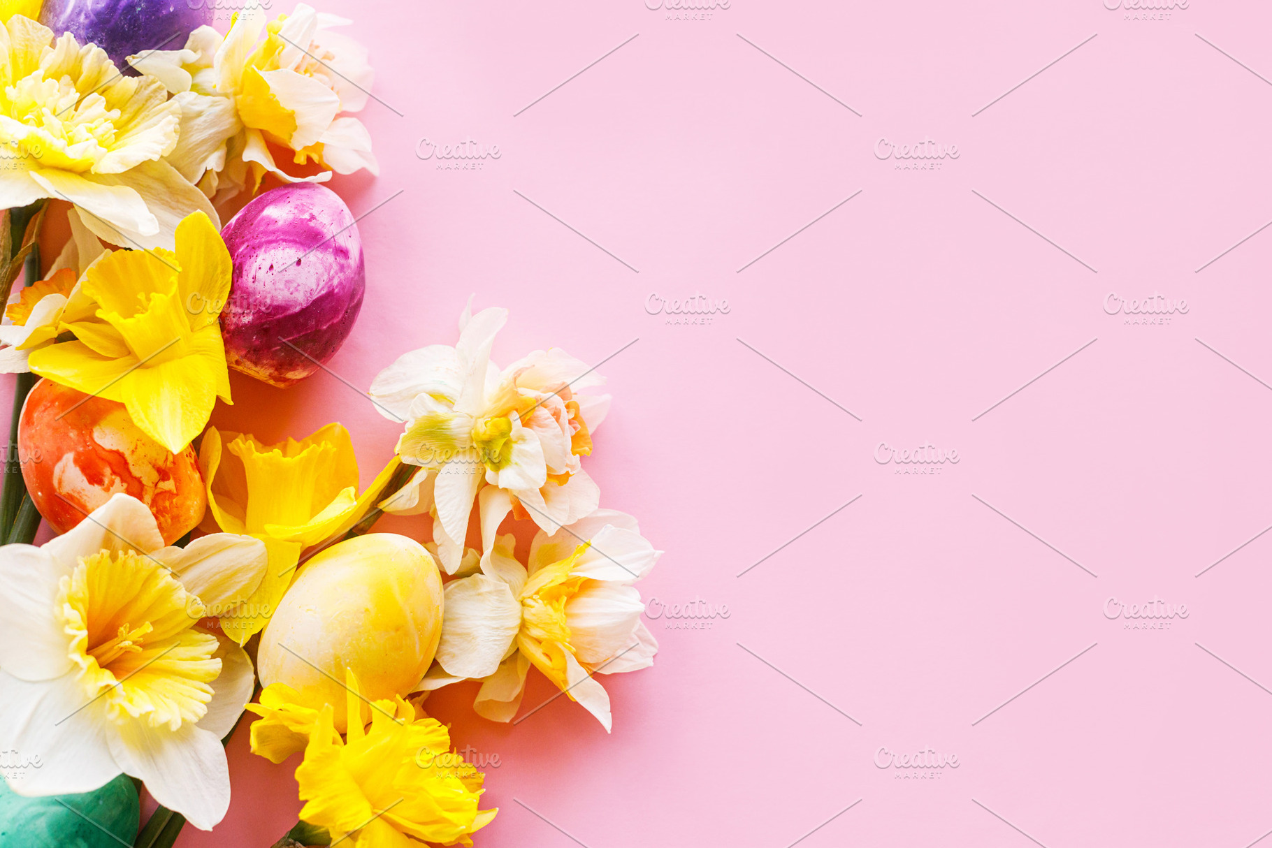 Happy Easter! Colorful Easter eggs with daffodils flowers flat l, a Holiday Photo by Sonjachni