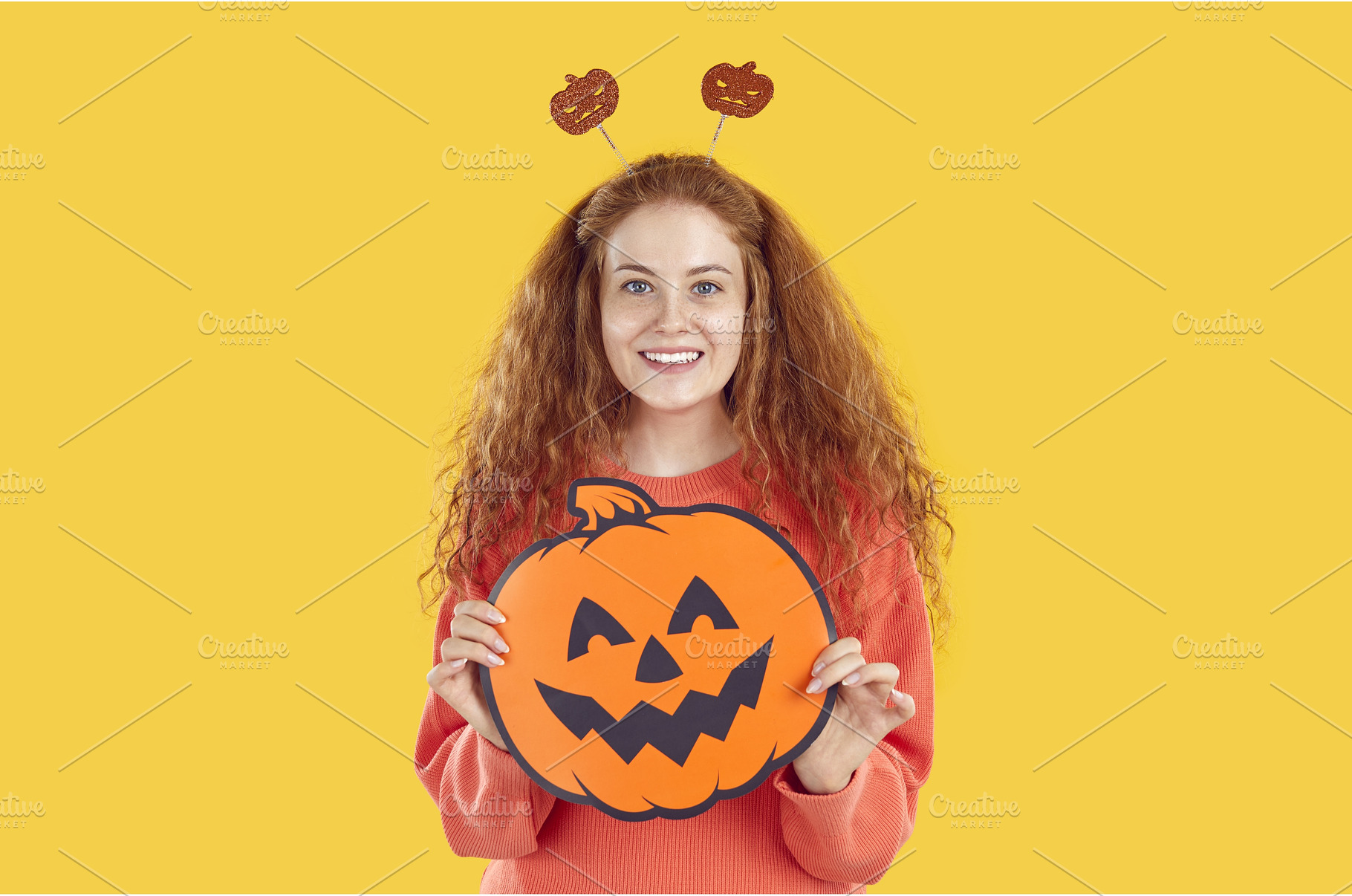 Happy young woman in funny pumpkin, a Person Photo by StudioRomantic