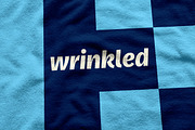 Wrinkled Logo Mockup Collection, an Apparel Mockup by Fields (Thumbnail 16 of 19)