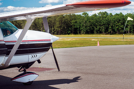 Small private plane in airport, a Transportation Photo by New York Art Store