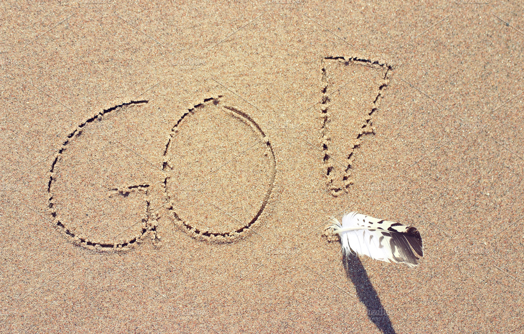 Word Go written on the beach, an Abstract Photo by BOOCYS