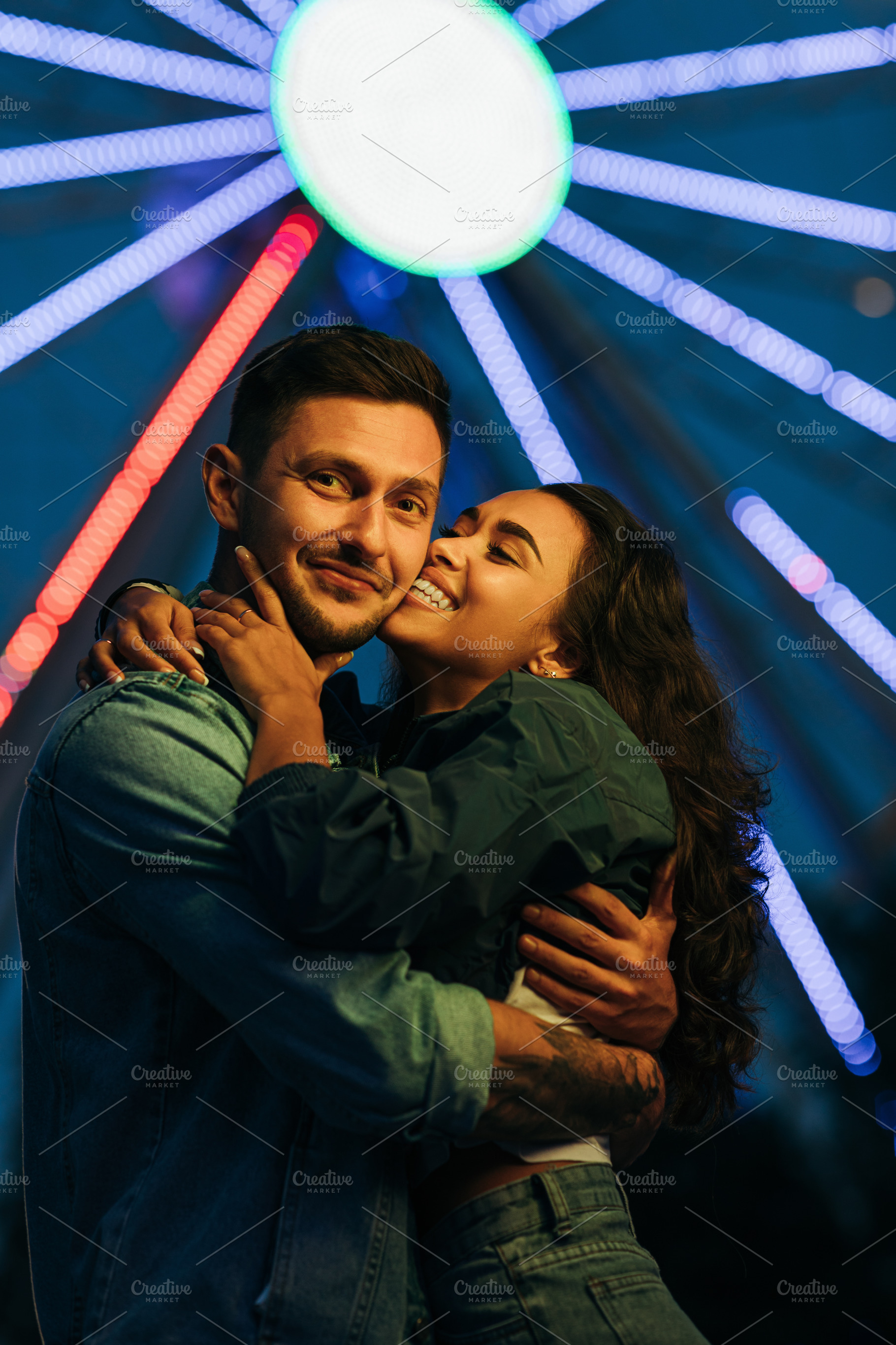 Young couple hugging and kissing, a Person Photo by Artem Varnitsin