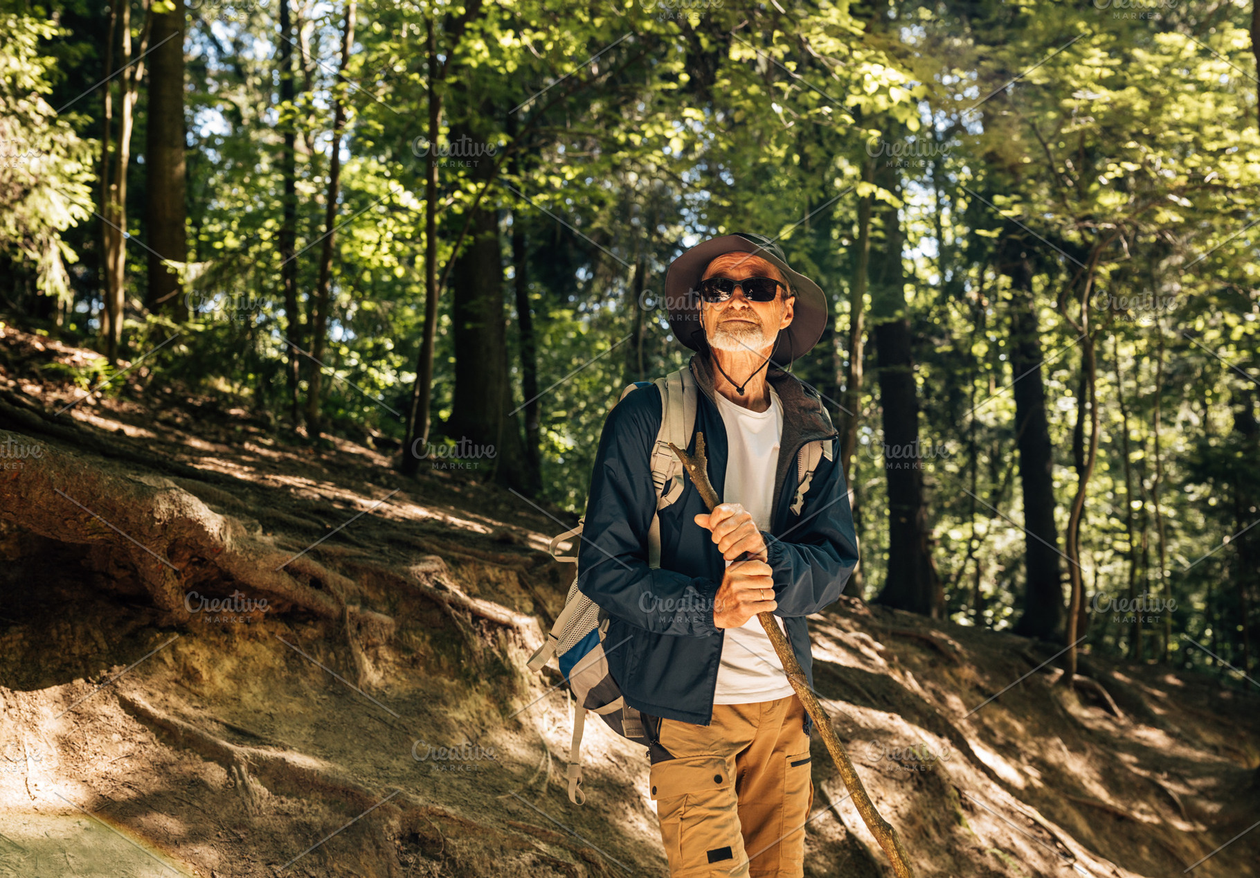 Senior male wearing eyeglasses, a Person Photo by Artem Varnitsin