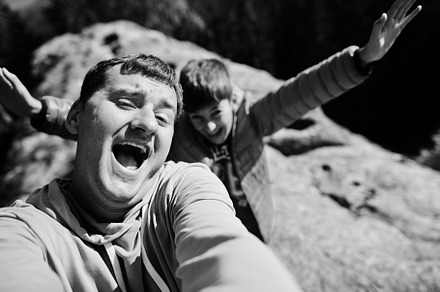 Father with son. Children hiking on beautiful day in mountains,, a Nature Photo by AS photostudio